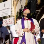 Archbishop performs exorcism to cleanse protest site