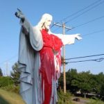 Basilica quickly restores Christ statue after it’s covered with red paint